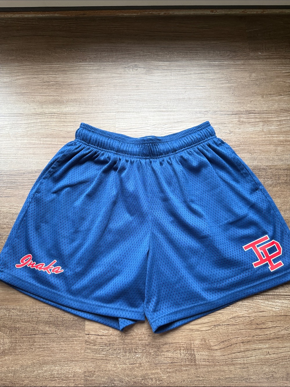 Inaka Power Blue Mesh Athletic Shorts with Red Accents